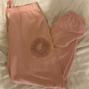aero light pink sun design sweatpants (size medium)